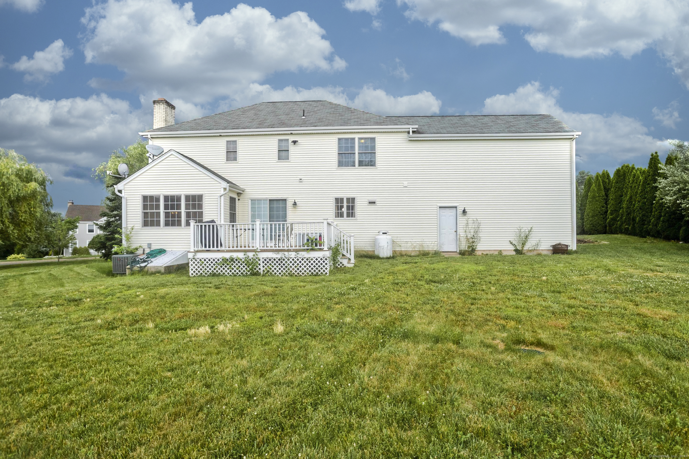 120 Scenic View Drive Middletown, CT 06457 - Photo 18 of 24 a front view of a house with garden