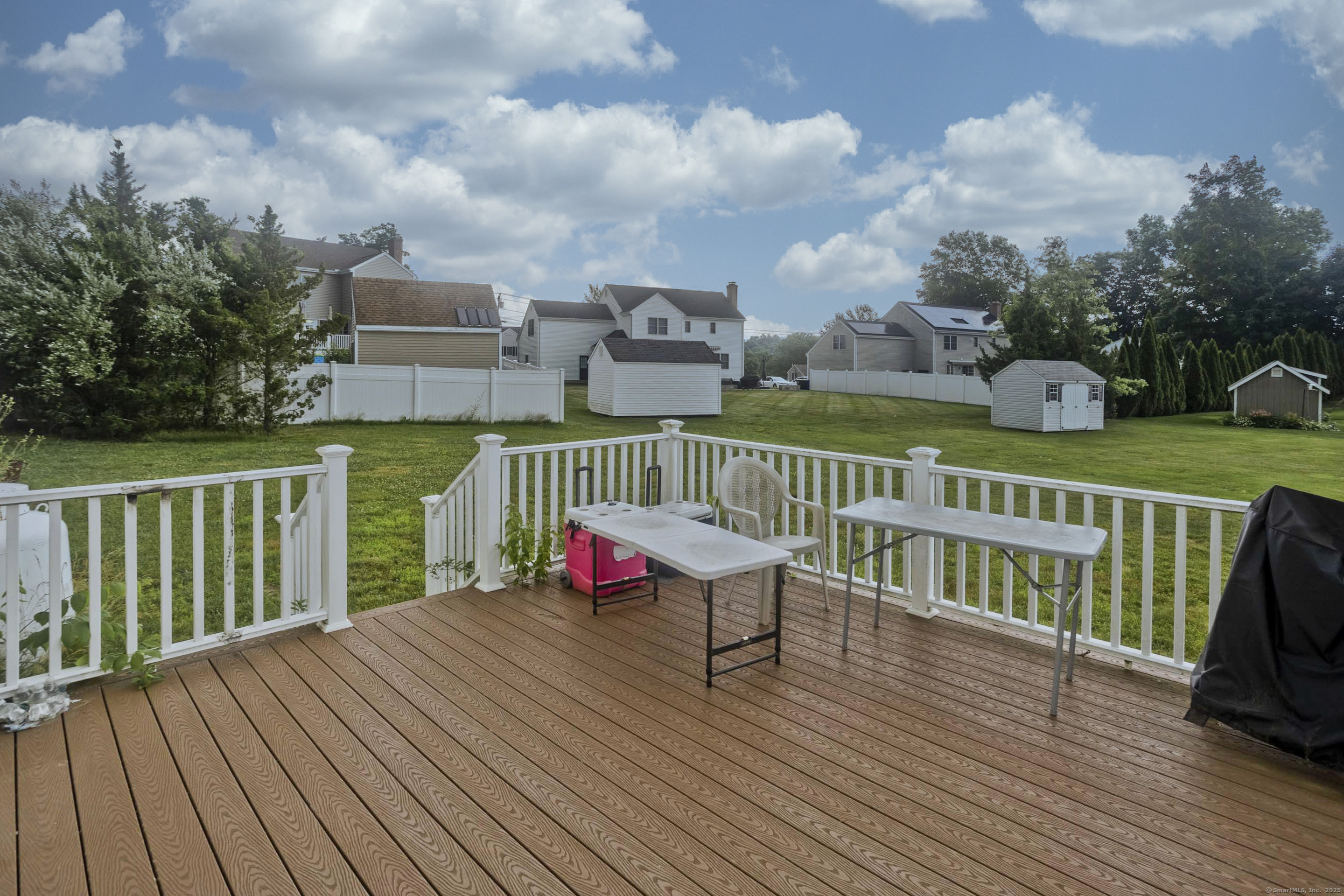 120 Scenic View Drive Middletown, CT 06457 - Photo 20 of 24 a view of roof deck with a table and chairs and wooden floor