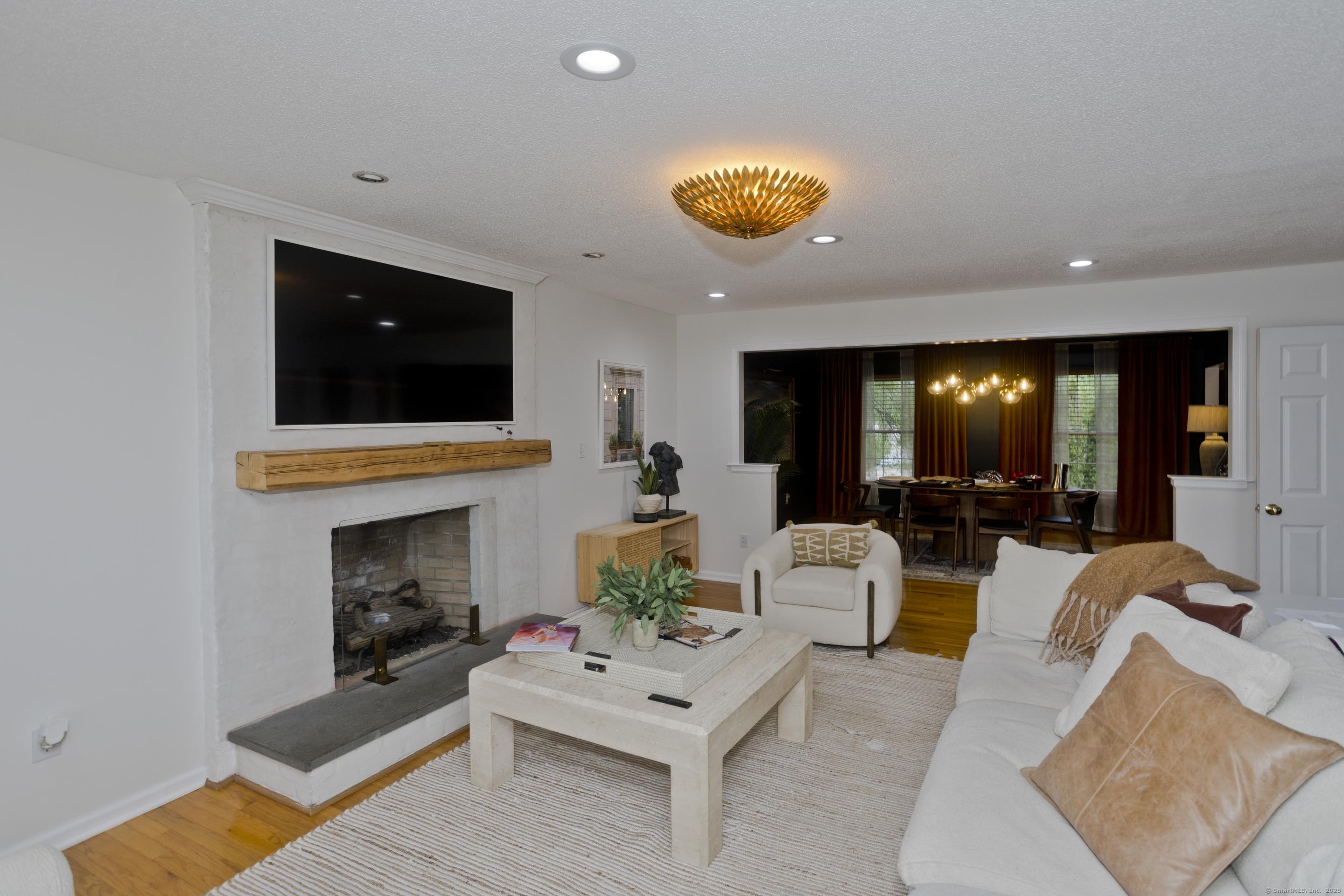 120 Scenic View Drive Middletown, CT 06457 - Photo 2 of 24 a living room with furniture and a flat screen tv