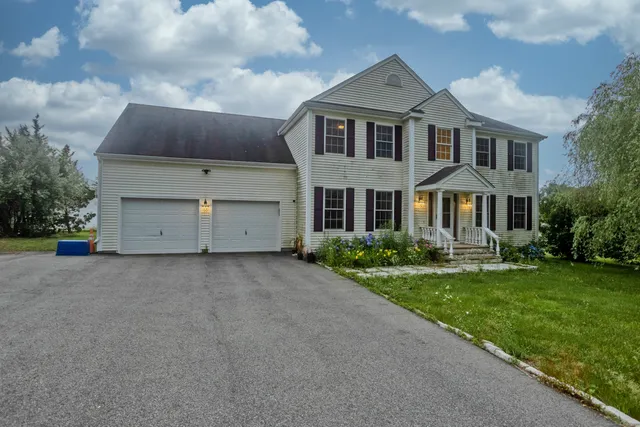 a big house with a big yard and more windows