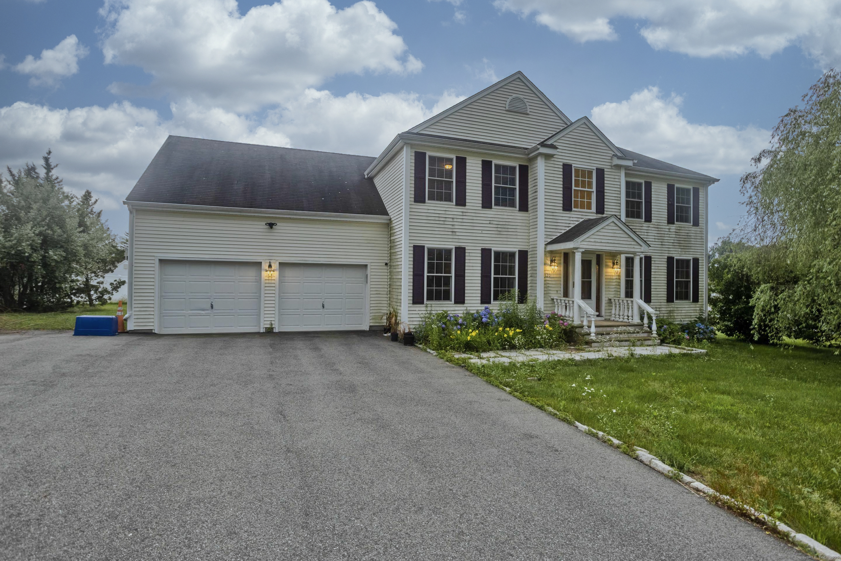 120 Scenic View Drive Middletown, CT 06457 - Photo 21 of 24 a big house with a big yard and more windows