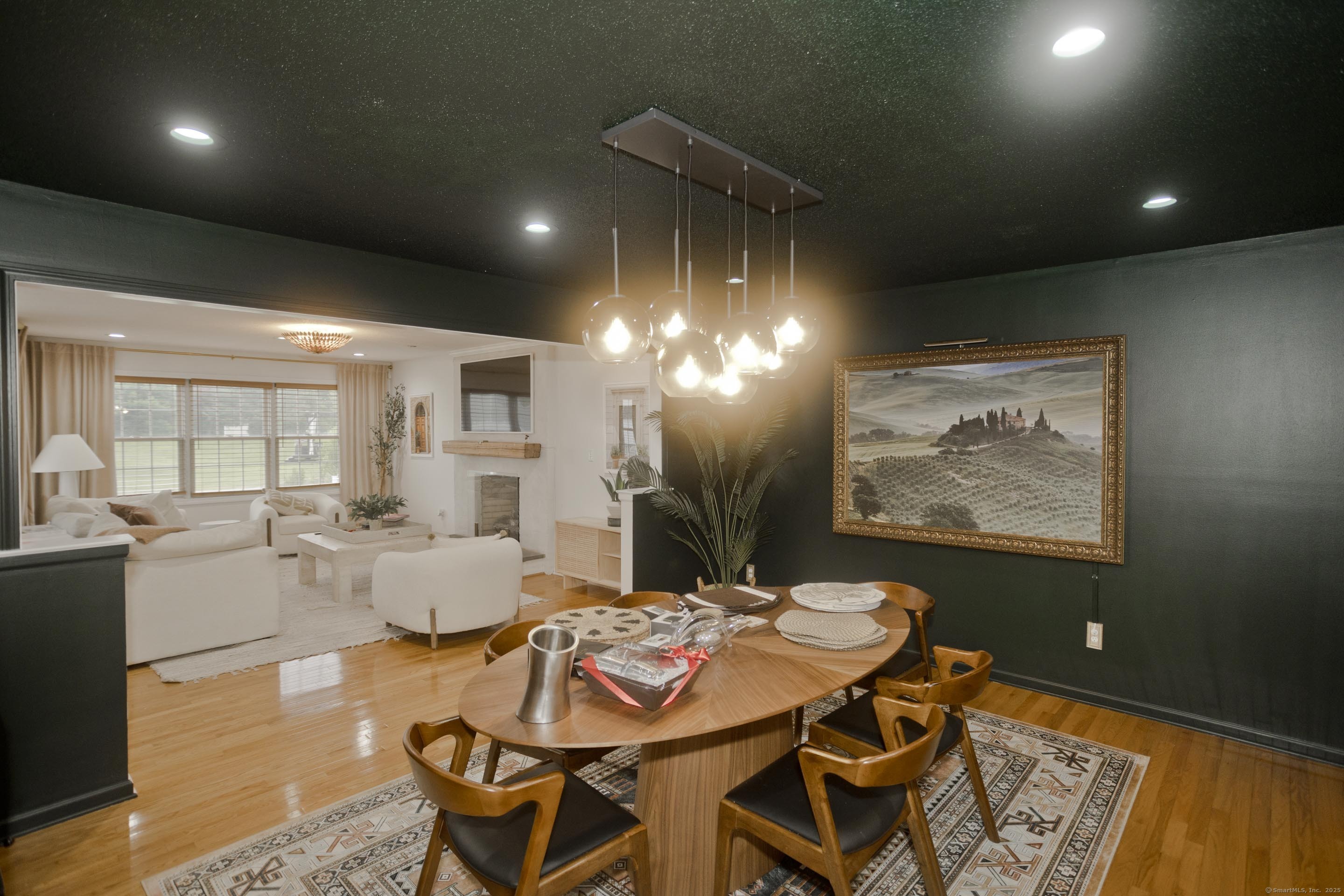 120 Scenic View Drive Middletown, CT 06457 - Photo 4 of 24 a view of a dining room with furniture a chandelier and wooden floor