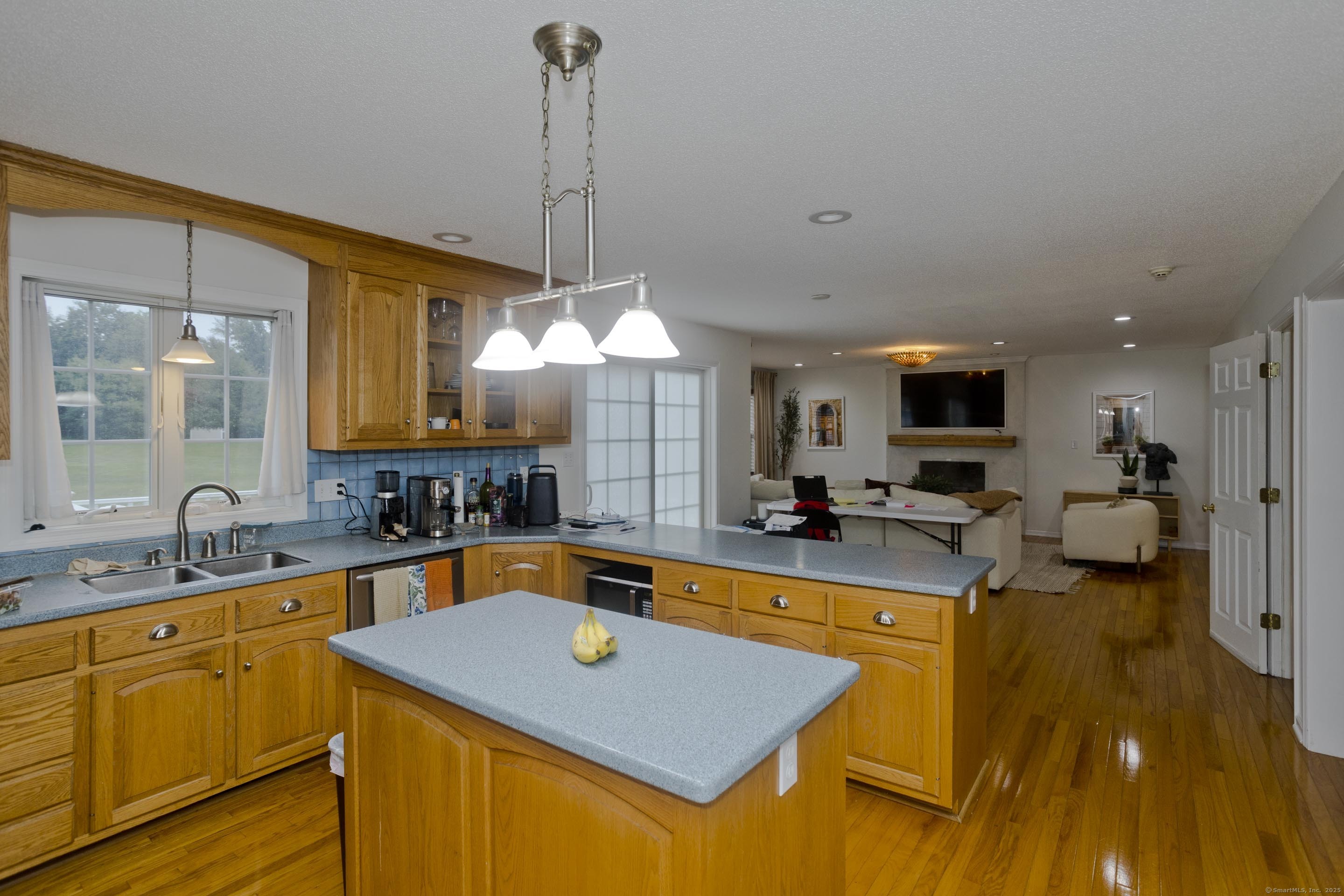 120 Scenic View Drive Middletown, CT 06457 - Photo 5 of 24 a kitchen with sink cabinets and living room