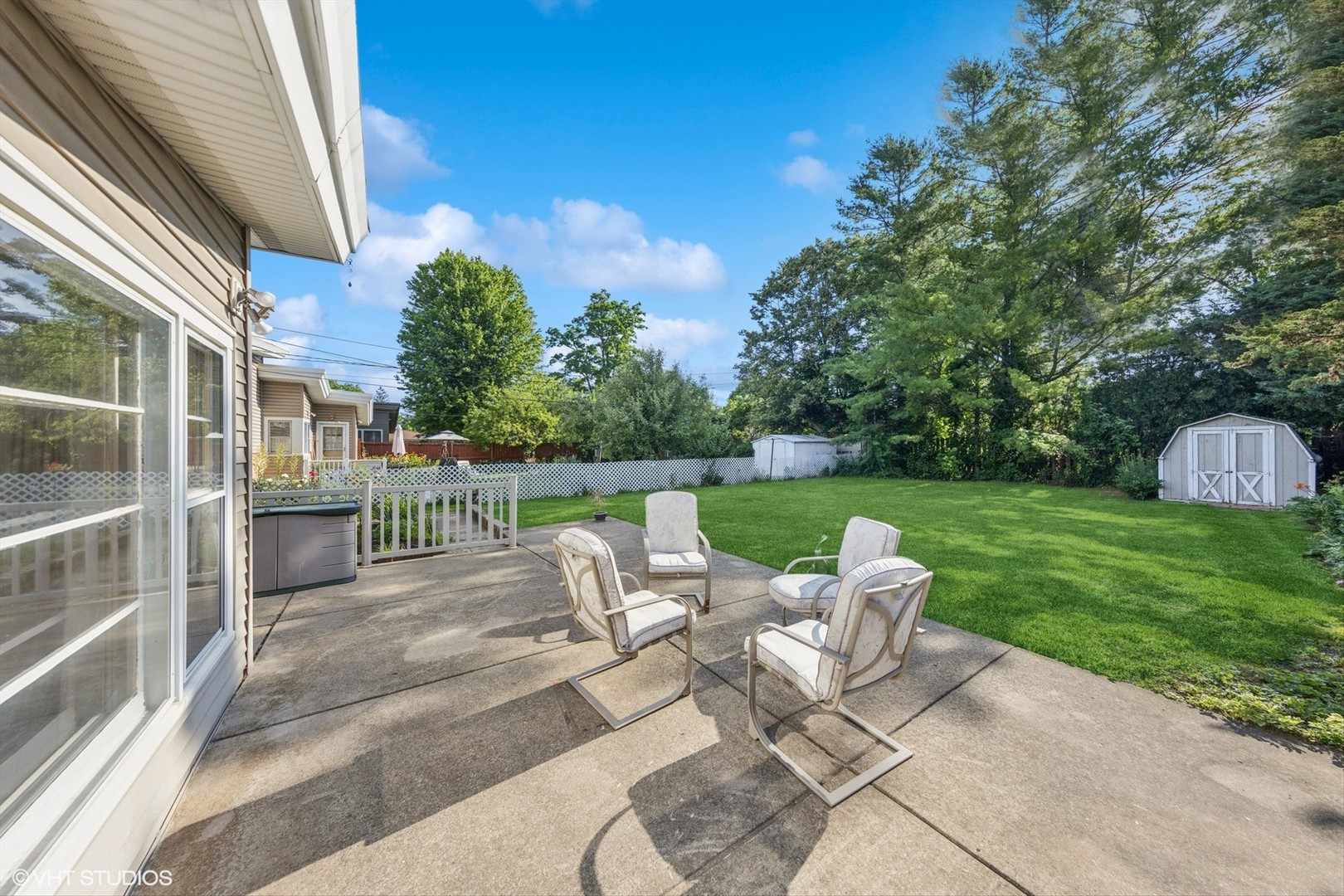 506 South Charleton Street Willow Springs, IL 60480 - Photo 21 of 21 a view of a chairs and table in backyard of the house