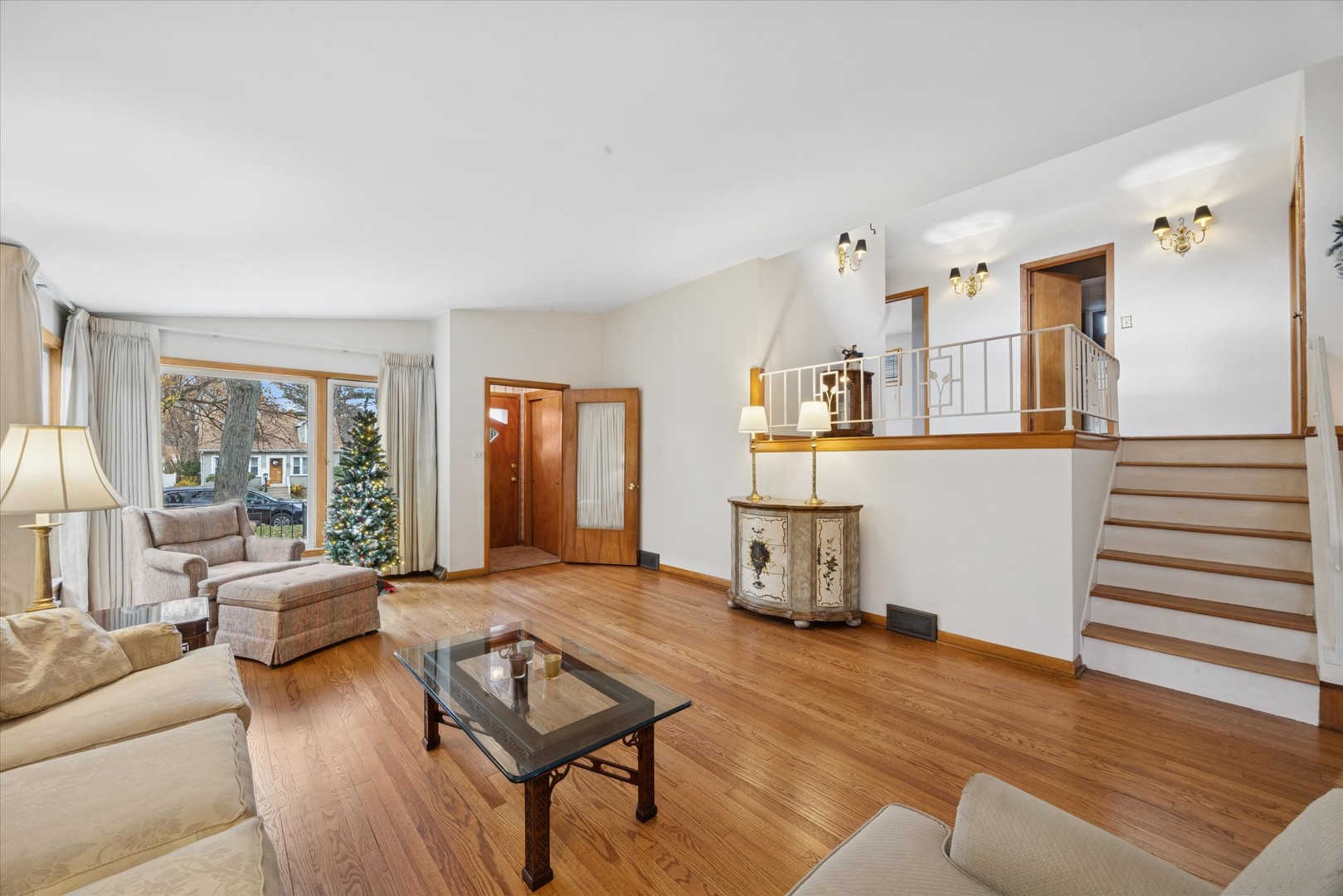 506 South Charleton Street Willow Springs, IL 60480 - Photo 3 of 21 a living room with furniture and a wooden floor
