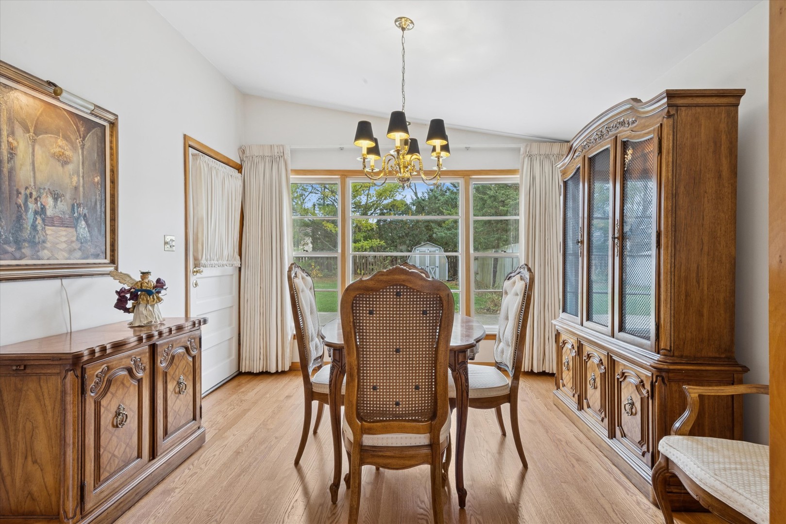 506 South Charleton Street Willow Springs, IL 60480 - Photo 7 of 21 a view of a dining room with furniture window and wooden floor
