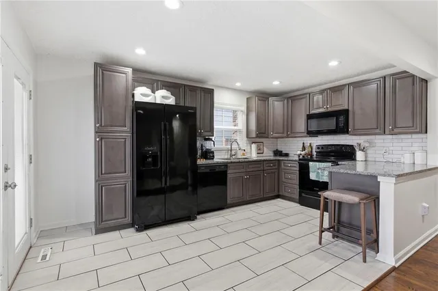 $355,000 | 515 South Meadowbrook Lane, Olathe, KS 66062