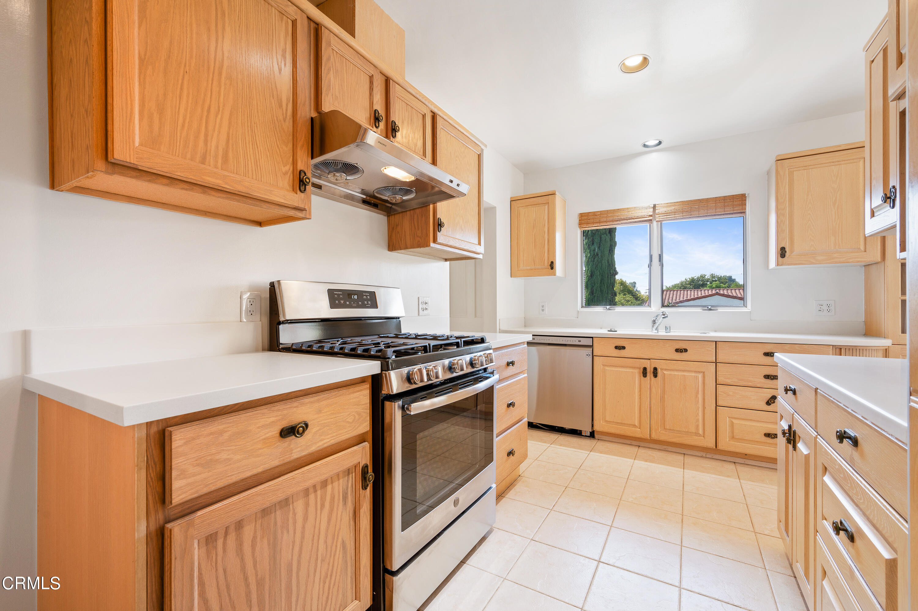 517 St Albans Road San Gabriel, CA 91775 - Photo 14 of 24 a kitchen with stainless steel appliances granite countertop a stove and a sink