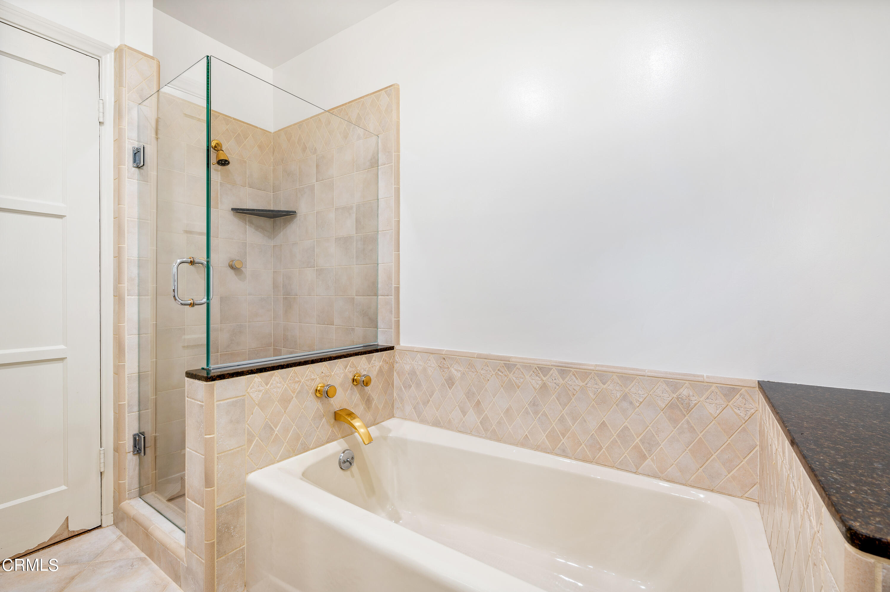 517 St Albans Road San Gabriel, CA 91775 - Photo 16 of 24 a bathroom with a bathtub and shower