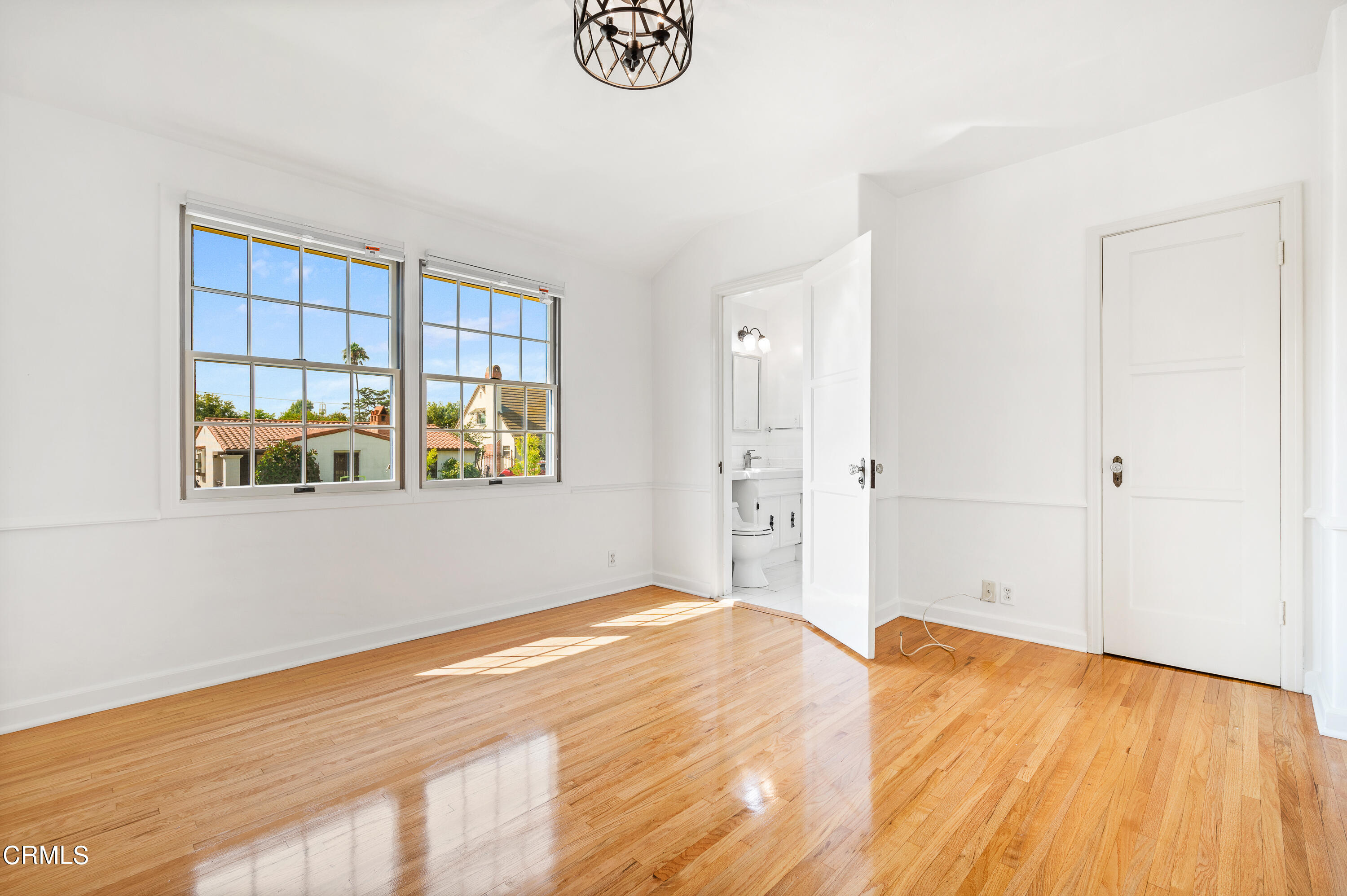 517 St Albans Road San Gabriel, CA 91775 - Photo 19 of 24 a view of empty room with window and wooden floor