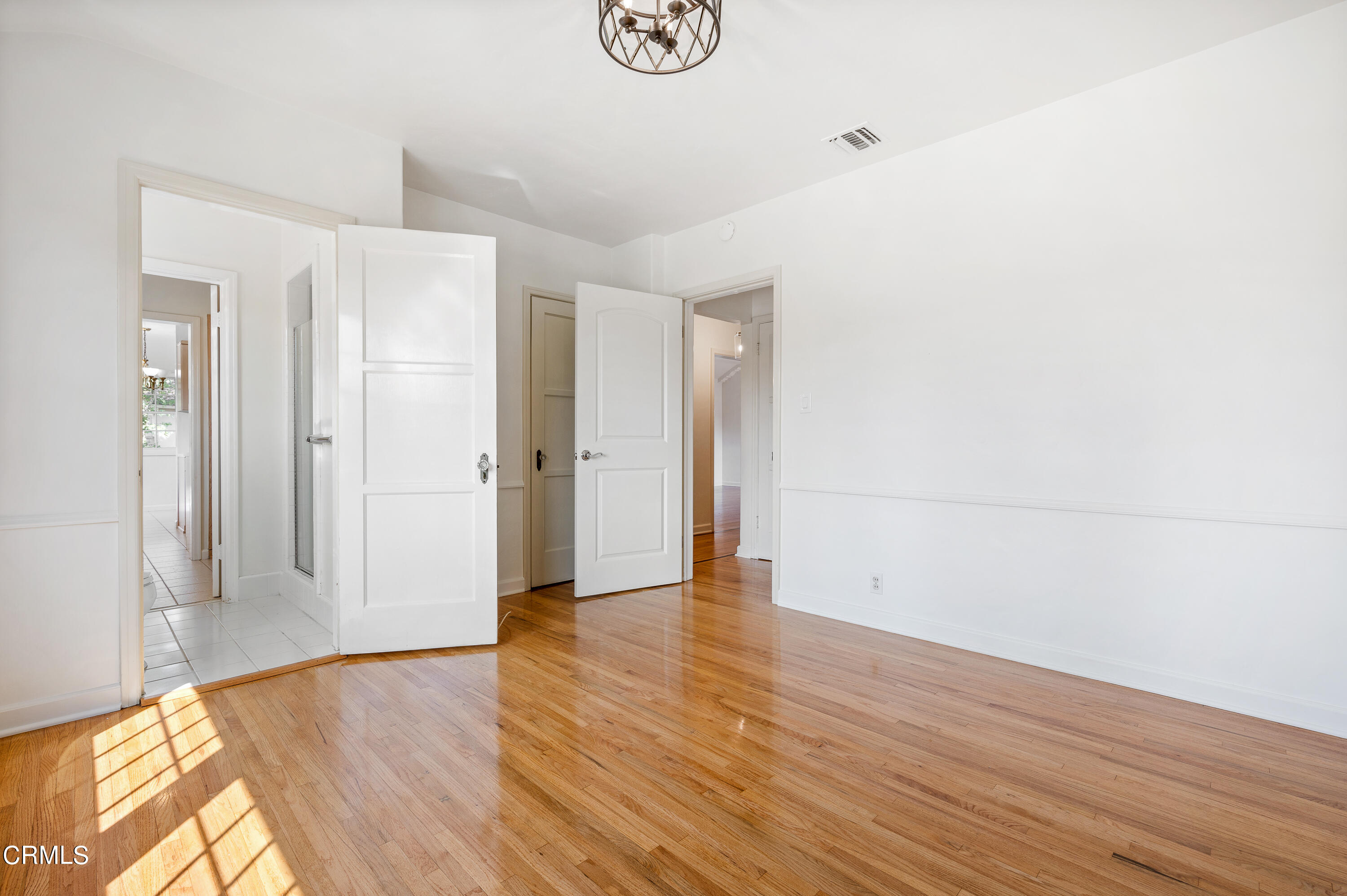 517 St Albans Road San Gabriel, CA 91775 - Photo 20 of 24 a view of an empty room with wooden floor