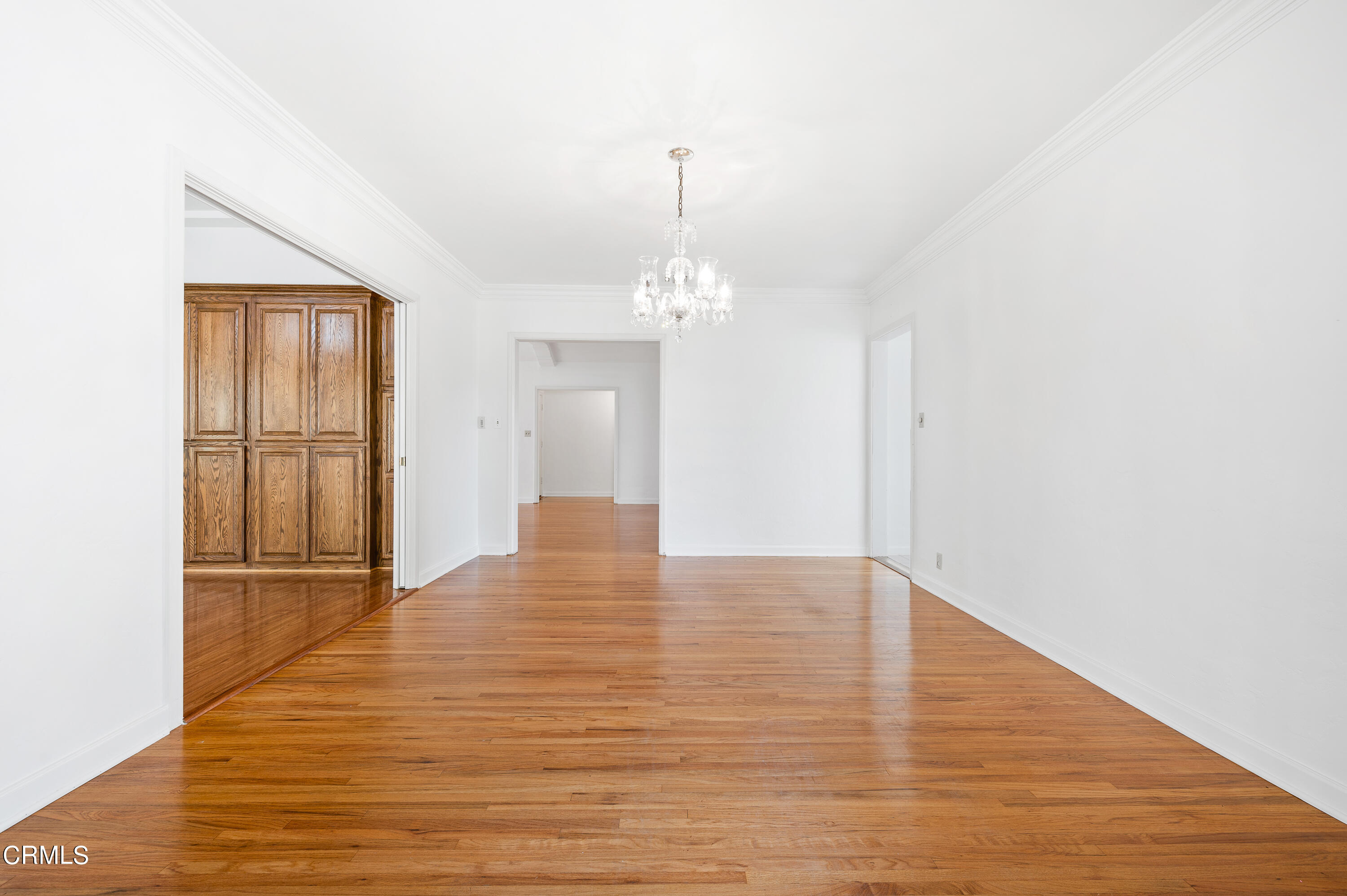 517 St Albans Road San Gabriel, CA 91775 - Photo 8 of 24 a view of empty room with wooden floor and fan