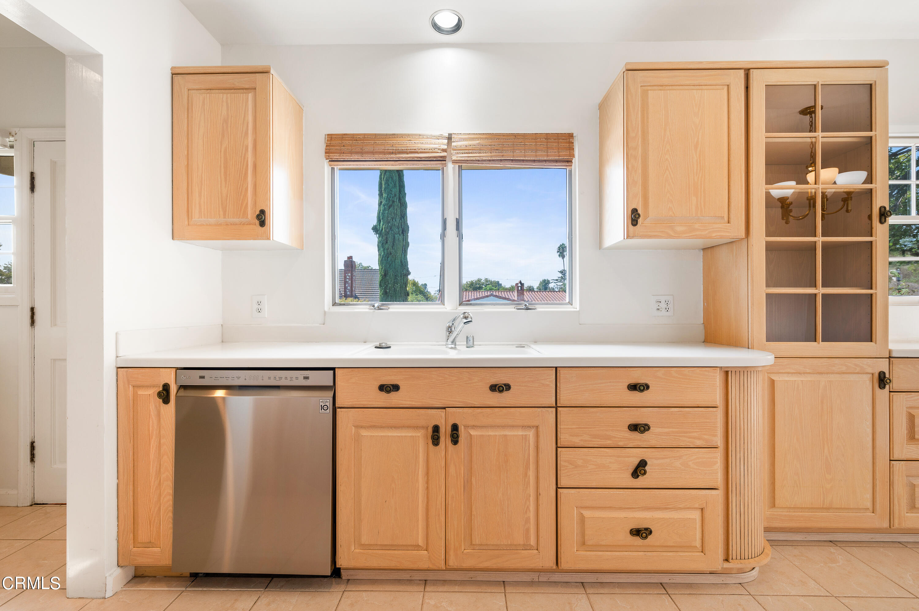 517 St Albans Road San Gabriel, CA 91775 - Photo 9 of 24 a kitchen with granite countertop cabinets and window