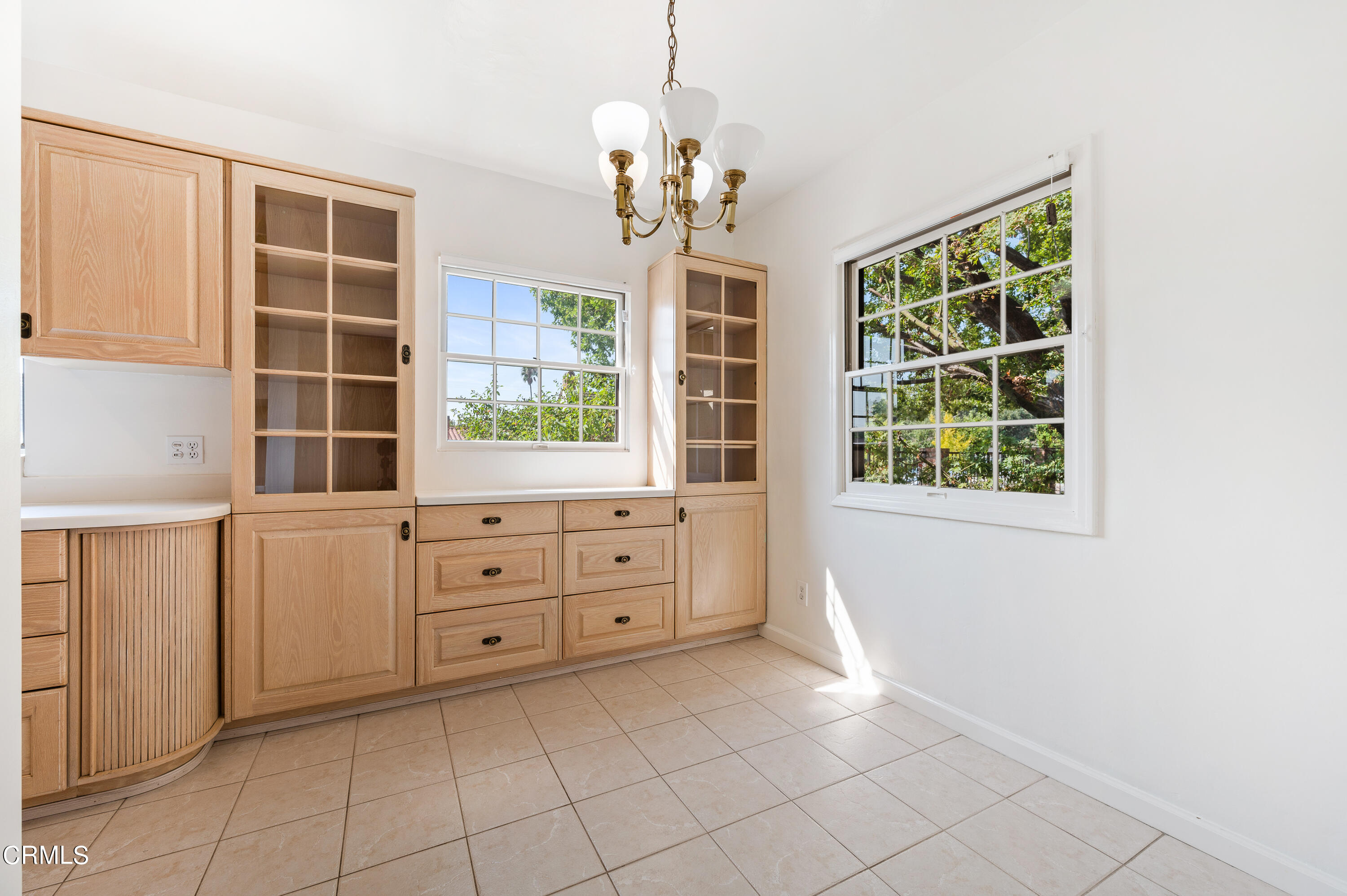 517 St Albans Road San Gabriel, CA 91775 - Photo 10 of 24 a room that has a window and a chandelier