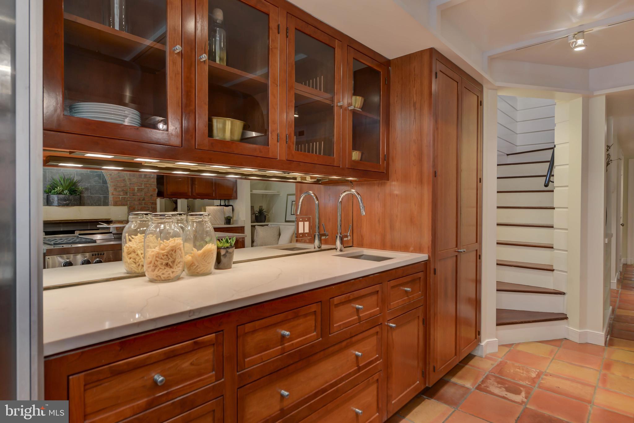 2130 Leroy Place Northwest Washington, DC 20008 - Photo 28 of 98 a kitchen with a sink and cabinets