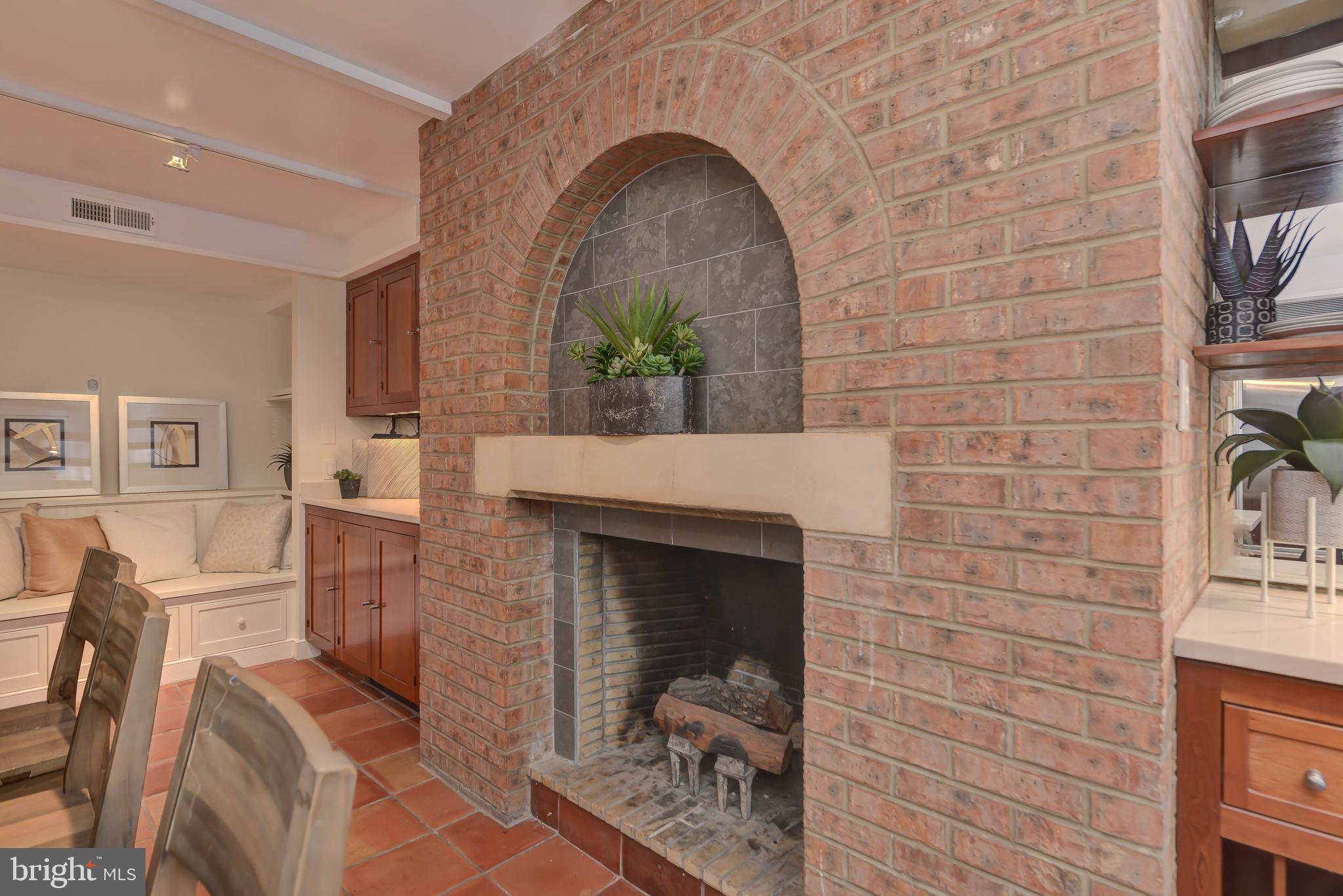 2130 Leroy Place Northwest Washington, DC 20008 - Photo 33 of 98 a living room with furniture and a fireplace