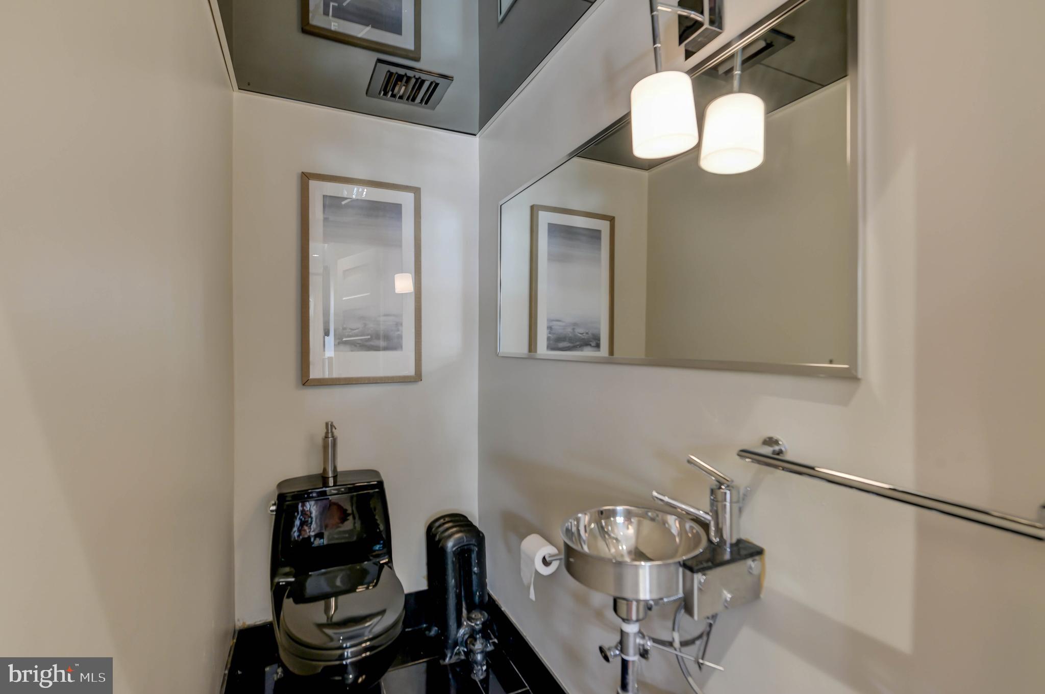 2130 Leroy Place Northwest Washington, DC 20008 - Photo 40 of 98 a view of a room with gym equipment