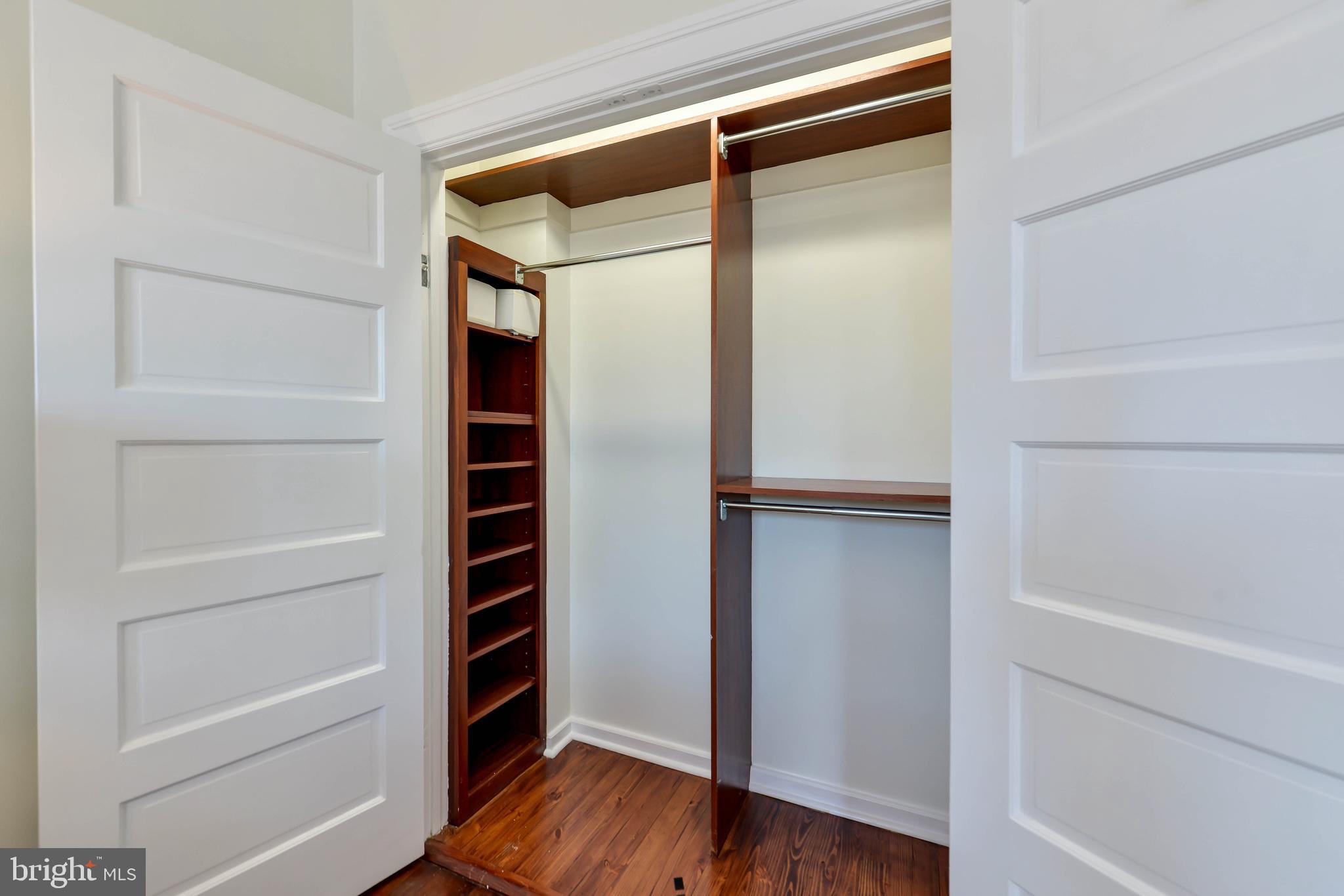 2130 Leroy Place Northwest Washington, DC 20008 - Photo 58 of 98 a view of walk in closet with empty racks