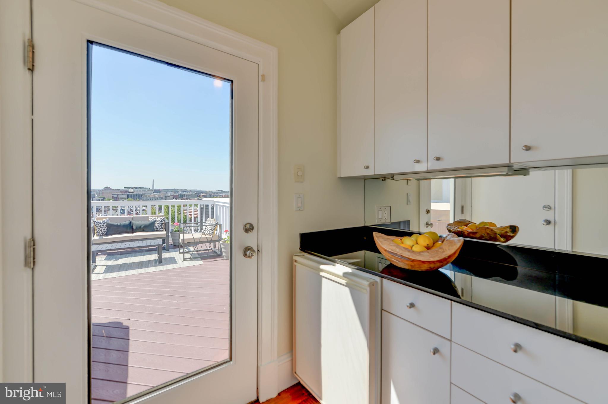 2130 Leroy Place Northwest Washington, DC 20008 - Photo 73 of 98 a kitchen with a sink and cabinets