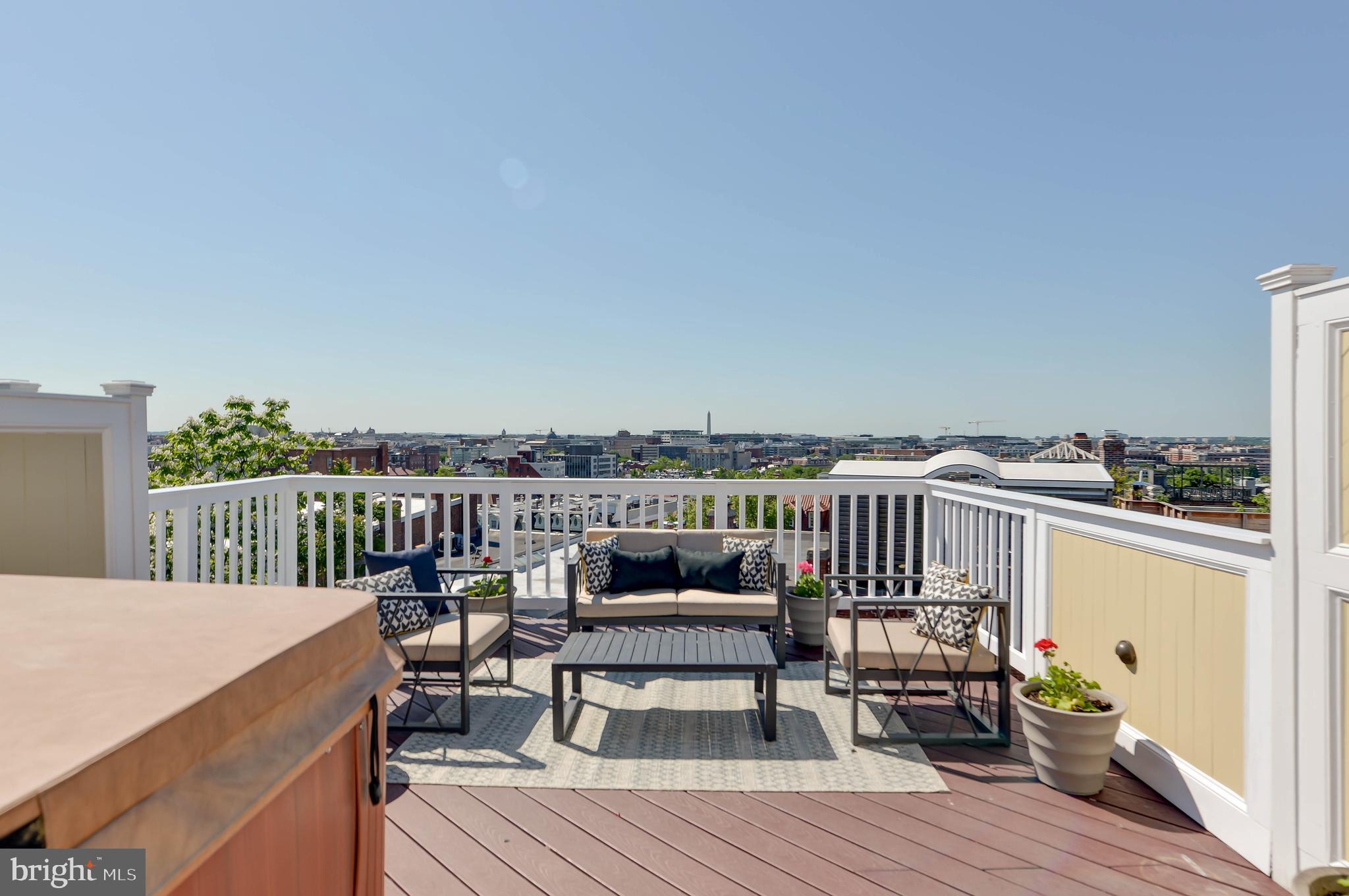 2130 Leroy Place Northwest Washington, DC 20008 - Photo 75 of 98 a view of a balcony with two chairs and wooden floor