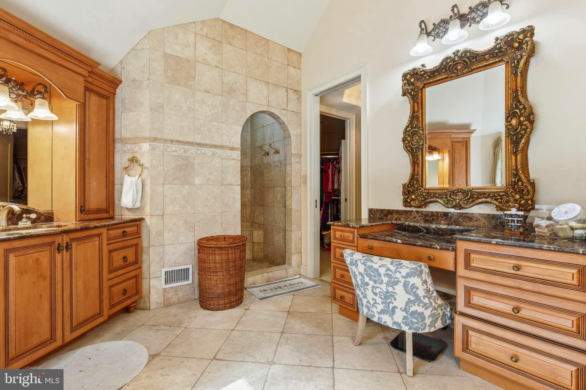 703 Daventry Way Ambler, PA 19002 - Photo 19 of 54 a bathroom with a granite countertop sink and a mirror