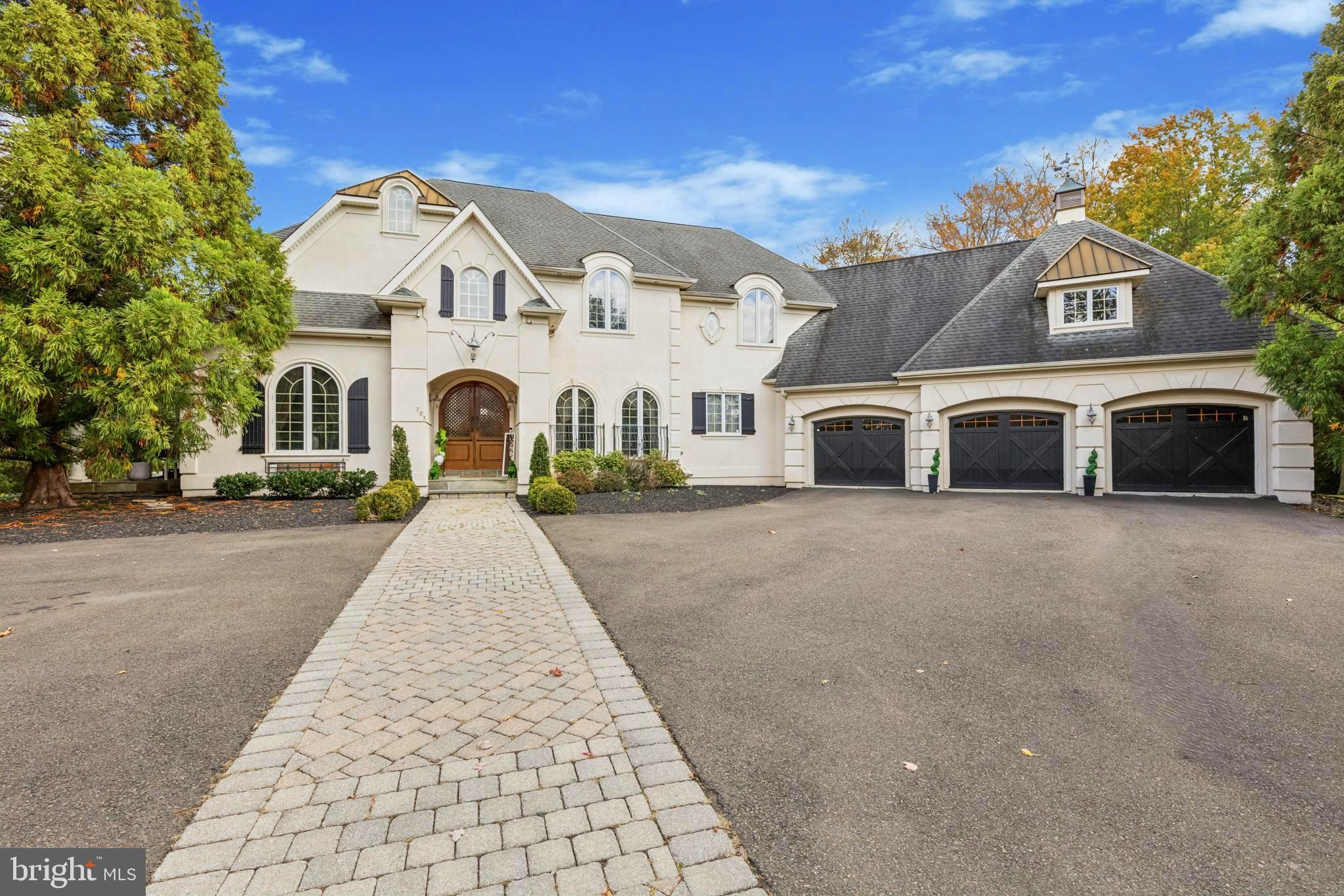 703 Daventry Way Ambler, PA 19002 - Photo 3 of 54 a front view of a house with a yard