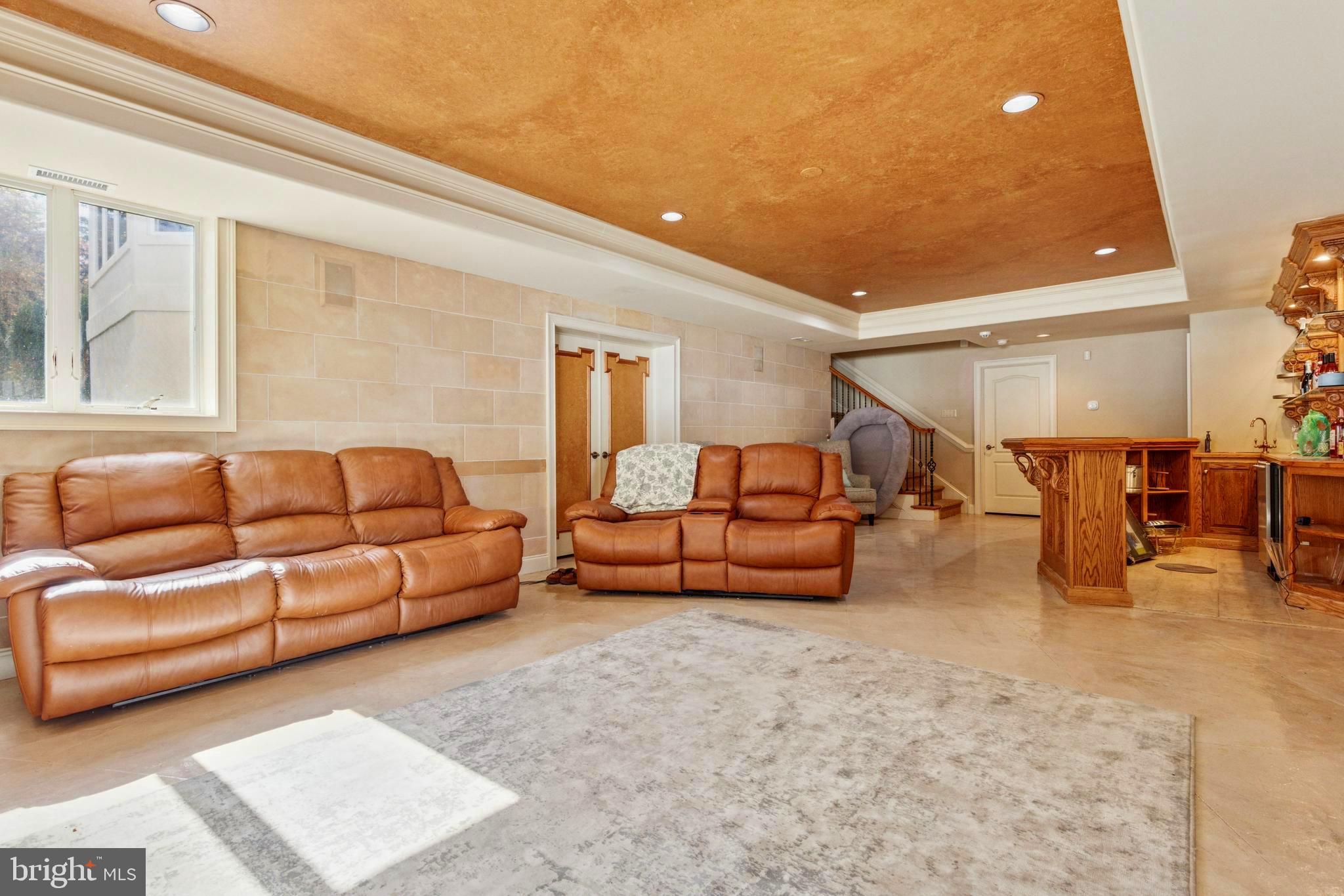 703 Daventry Way Ambler, PA 19002 - Photo 36 of 54 a living room with furniture and a couch