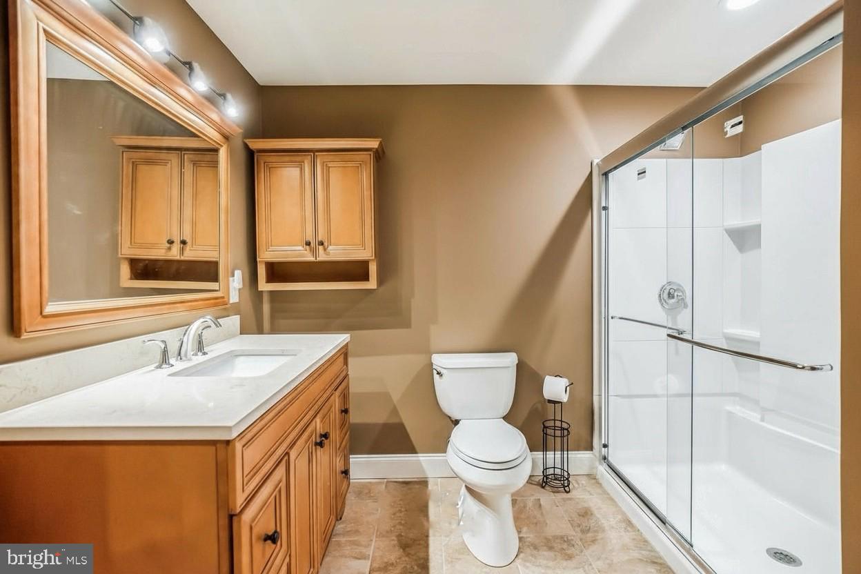 703 Daventry Way Ambler, PA 19002 - Photo 44 of 54 a bathroom with a sink a toilet and shower