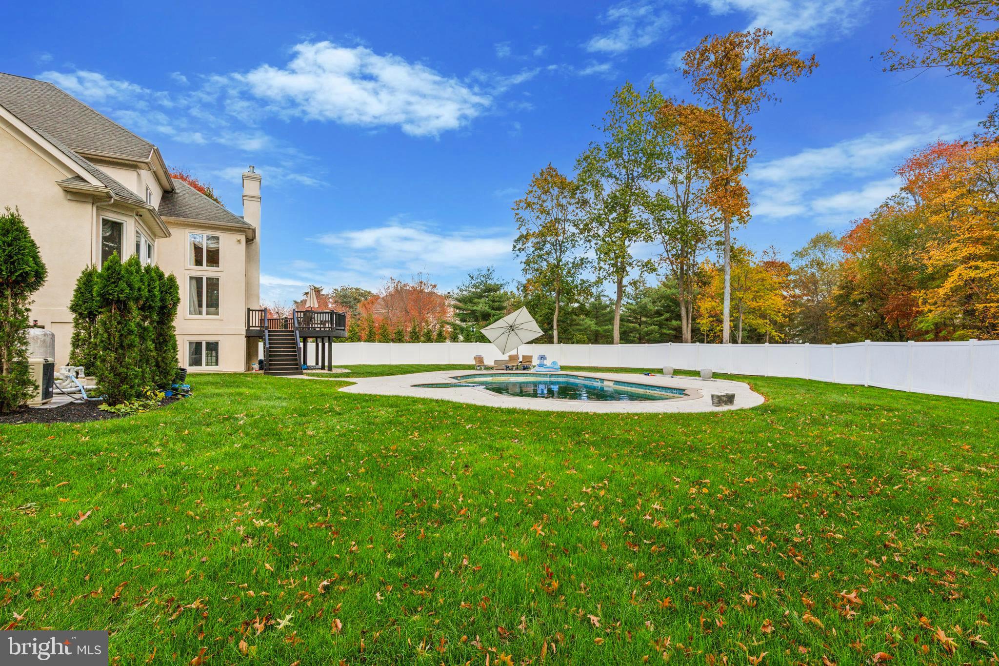 703 Daventry Way Ambler, PA 19002 - Photo 51 of 54 a swimming pool with some trees in the background