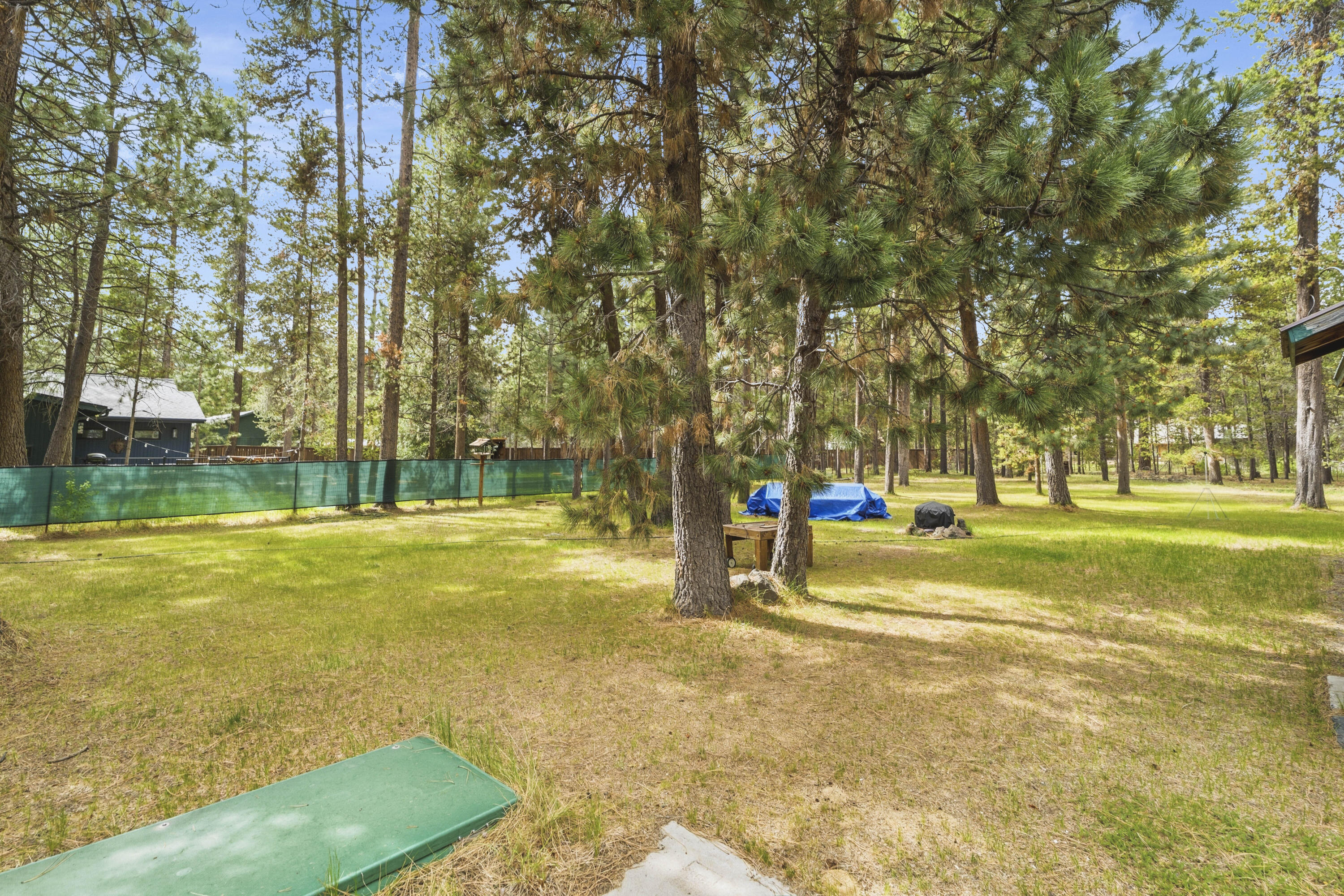 16928 Covina Road Bend, OR 97707 - Photo 29 of 48 a view of a playground with basketball court