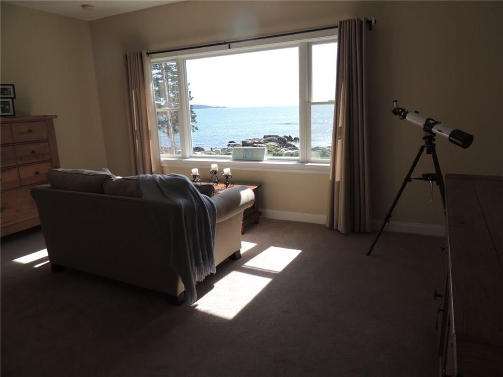 364 Pettegrow Point Road Machiasport, ME 04655 - Photo 12 of 34 Master bedroom view.
