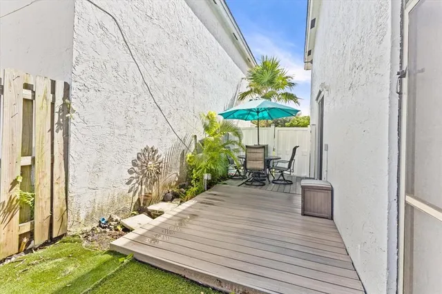 swimming pool view with a seating space