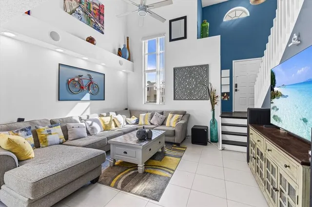 a living room with furniture and a rug