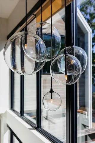 a view of a living room with furniture and a window