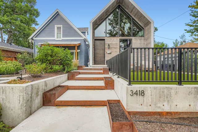 a view of entrance gate of a house