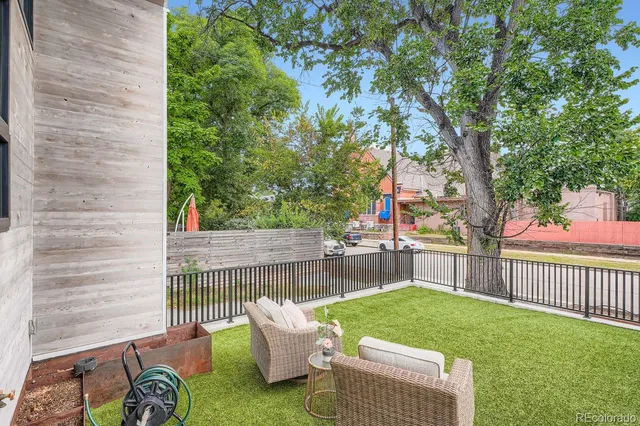 a kitchen with a stove a sink and a refrigerator