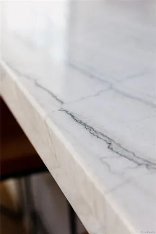 a view of a dry room with wooden floor