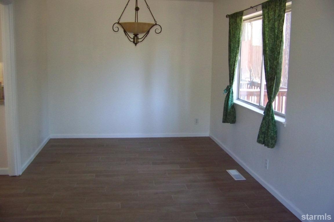 165 Pinion Road Markleeville, CA 96120 - Photo 14 of 34 an empty room with windows