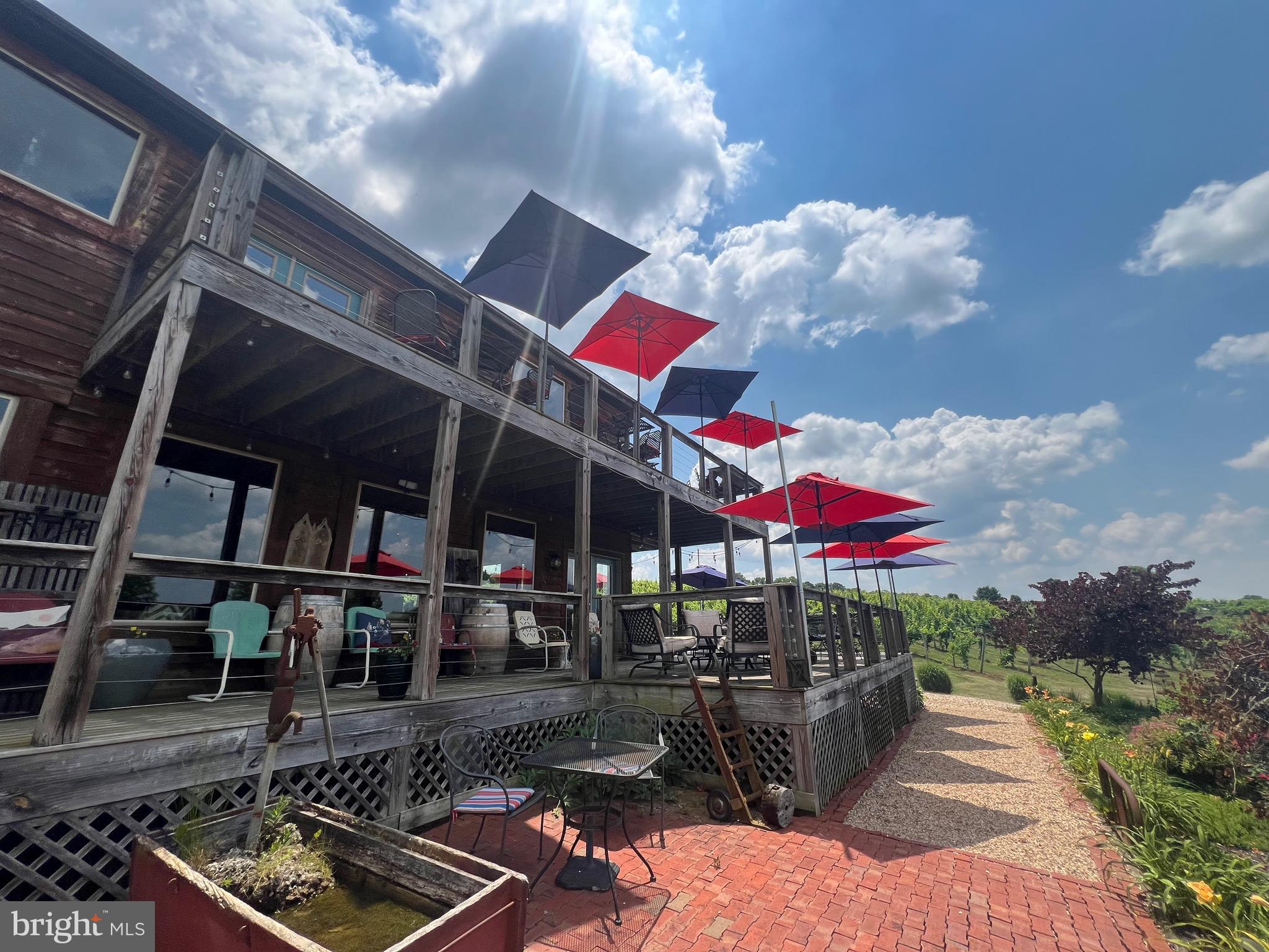 2110 Quicksburg Road Quicksburg, VA 22847 - Photo 17 of 54 a view of a chairs and tables in patio