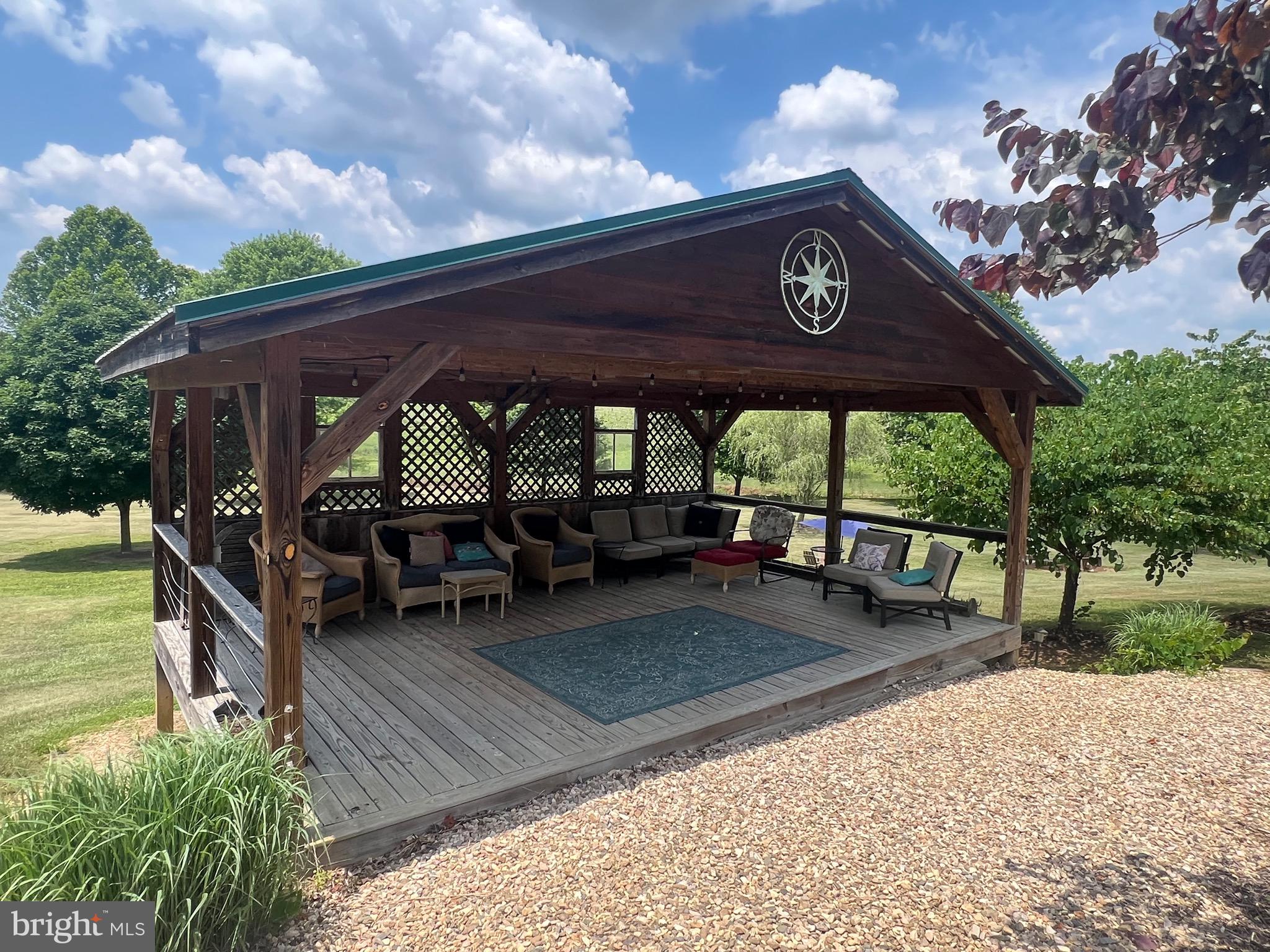 2110 Quicksburg Road Quicksburg, VA 22847 - Photo 21 of 54 a view of a chairs and table in the patio