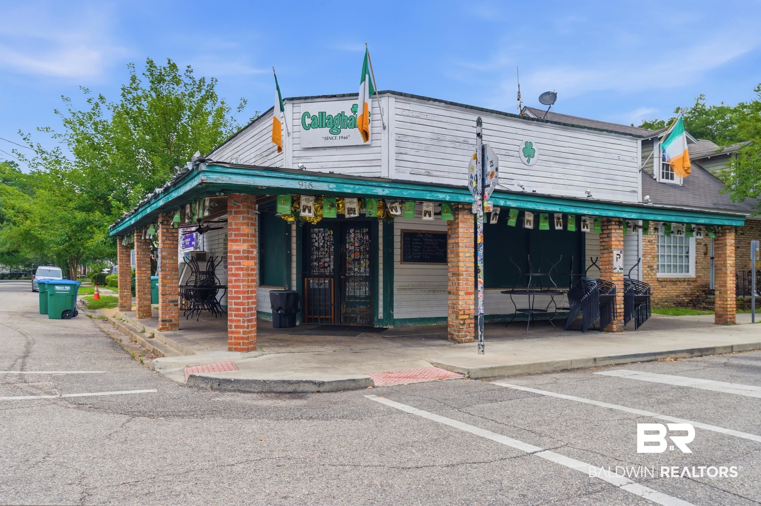 350 Charles Street Mobile, AL 36604 - Photo 43 of 52 Corner commercial building featuring white siding and a green trim
