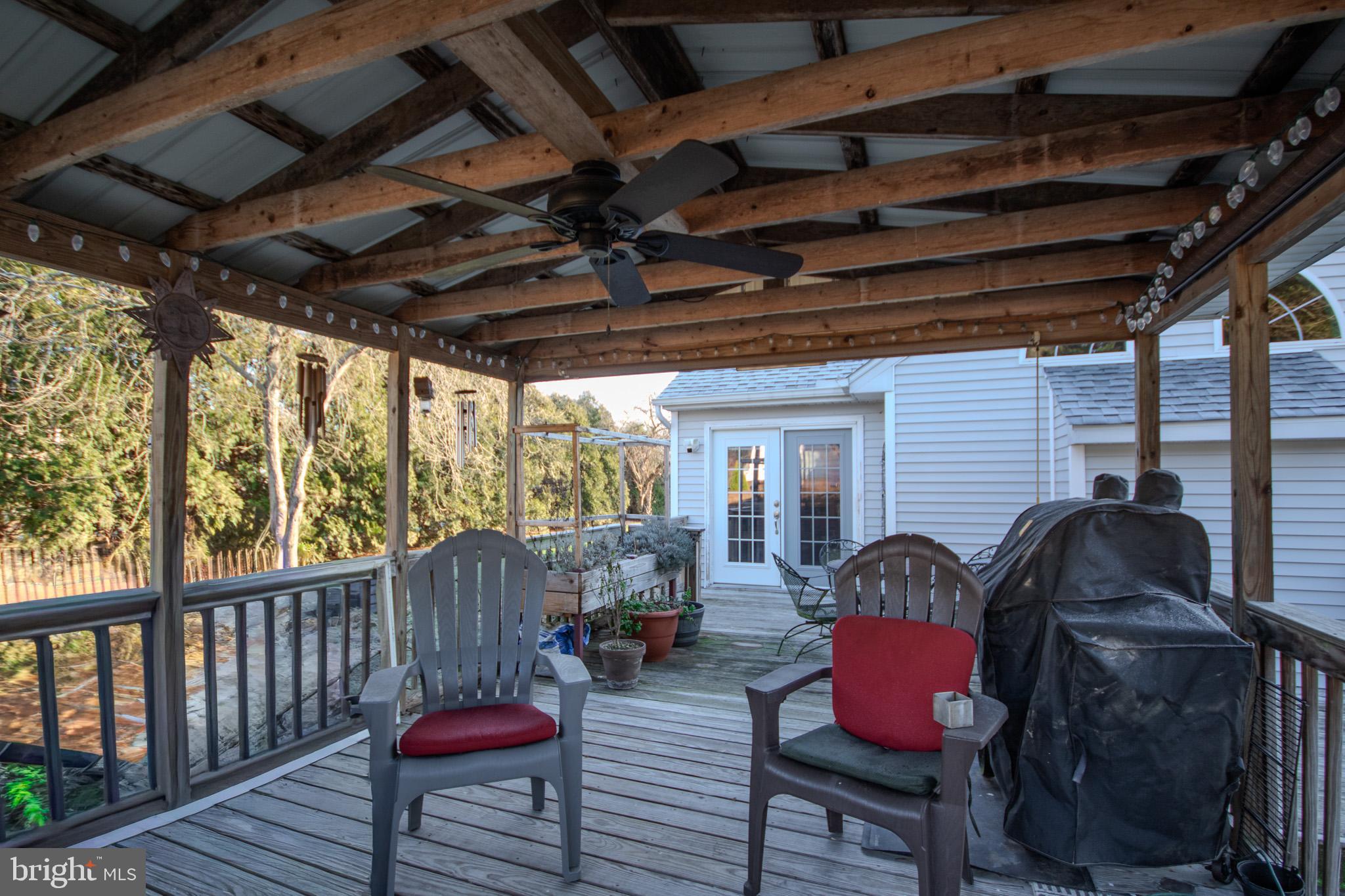 5520 Cedarcrest Road Salisbury, MD 21801 - Photo 33 of 41 a outdoor space with patio lots of furniture and wooden floor