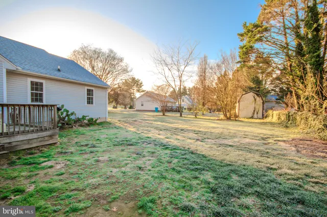 view of a house with a yard