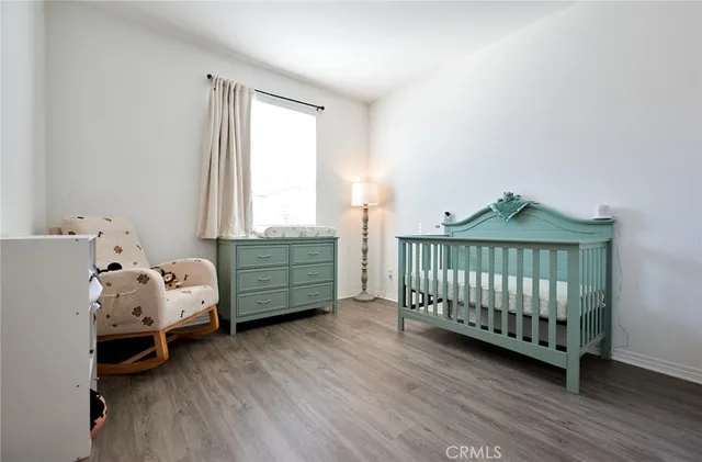 a bathroom with a shower sink and toilet