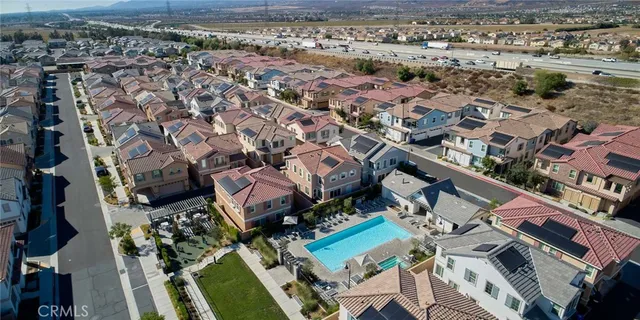 an aerial view of a house with a garden