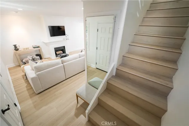 a bathroom with a double vanity sink mirror and toilet