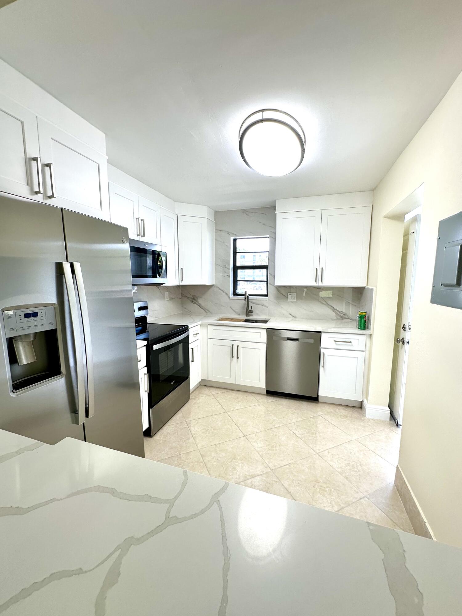 9440 Southwest 8th Street, Unit 109 Boca Raton, FL 33428 - Photo 1 of 14 Kitchen