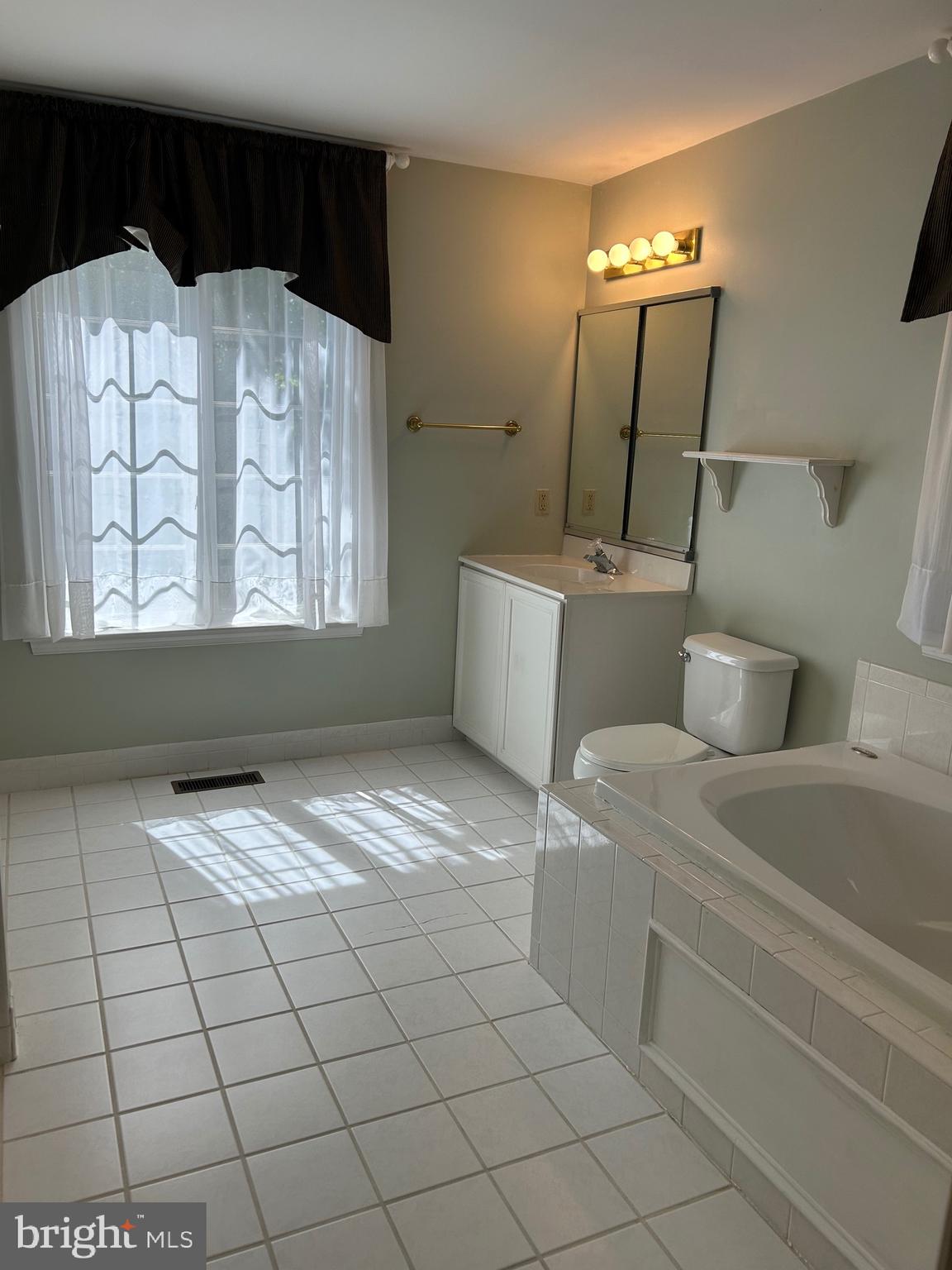 309 Newport Place Exton, PA 19341 - Photo 11 of 33 a bathroom with a sink mirror and vanity