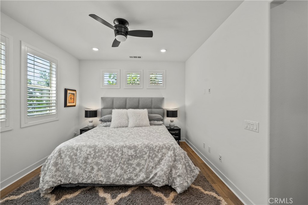1663 Rosewell Road West Covina, CA 91791 - Photo 17 of 45 a bedroom with a bed and a ceiling fan