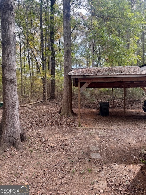 1769 Duncan Road Commerce, GA 30530 - Photo 16 of 16 a view of a yard with large tree